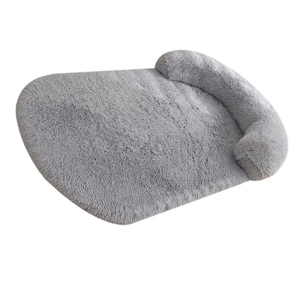 Light grey plush bolster bed, side view