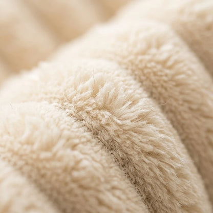 Close-up of the cream corduroy fleece fabric