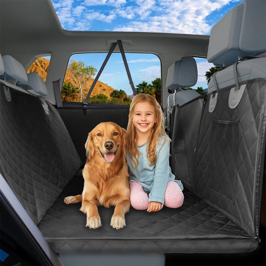 Golden retriever and child sitting on a back seat extender platform with side flaps