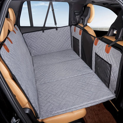 Grey quilted rear seat extender for dogs with door flaps