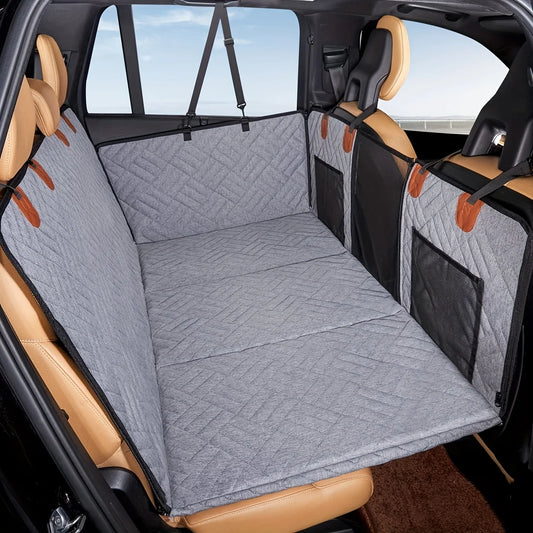 Grey quilted rear seat extender for dogs with door flaps