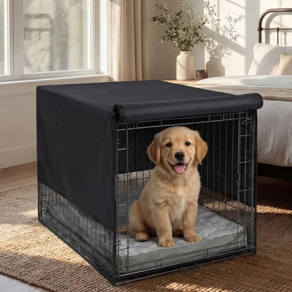 Golden retriever in a wire crate with the black cover rolled up at the front