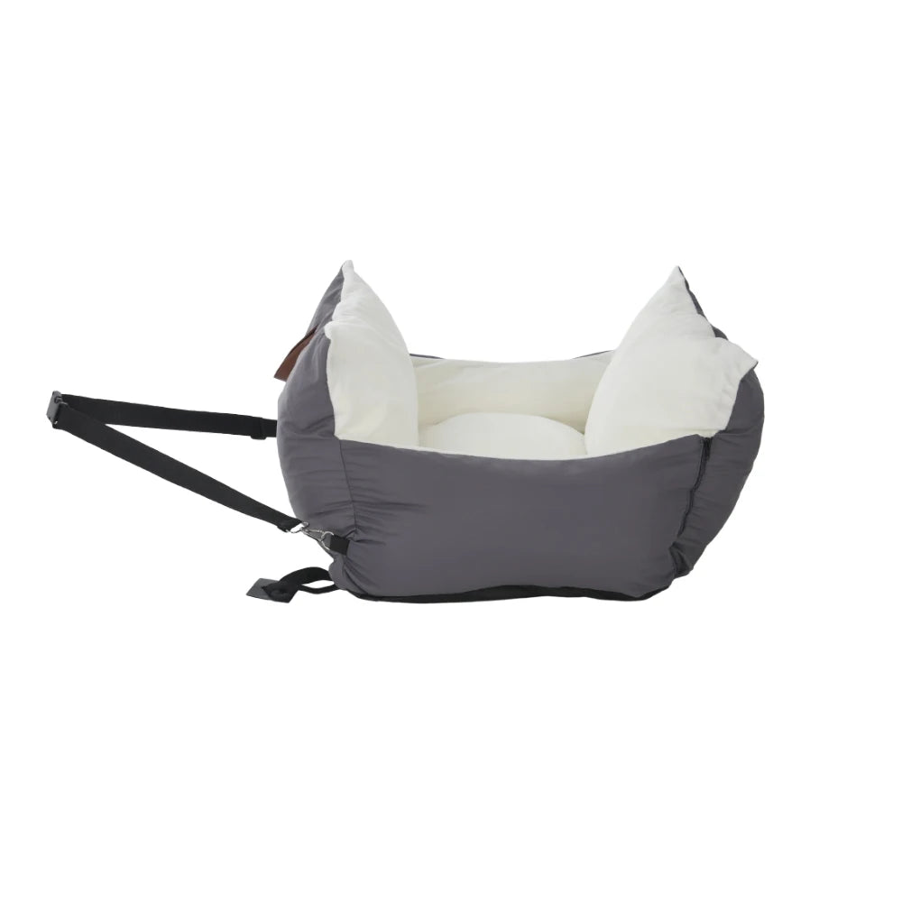 Grey travel car seat bed with seat belt strap, side view