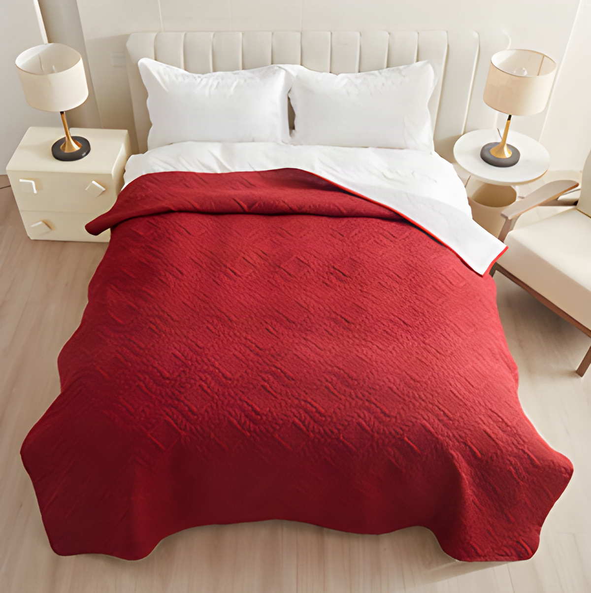 Red waterproof quilted dog blanket spread over a bed